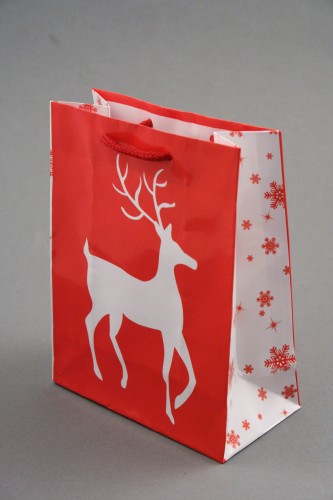 Glossy Red Christmas Gift Bag with White Reindeer Design. Red Corded Handles. Size Approx 15cm x 12cm x 6cm.
