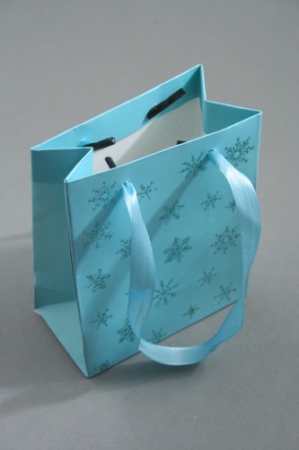 Turquoise Gift Bag with Snowflake Glitter Print. Ribbon Handles. Approx Size 11cm x 9cm x 5cm