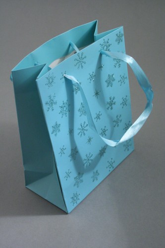 Turquoise Gift Bag with Snowflake Glitter Print. Ribbon Handles. Approx Size 15cm x 12cm x 6cm