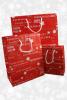 Red Christmas Gift Bag with White Festive Christmas Writing and White Cord Handles. . Size Approx 32cm x 26cm x 10cm. - view 2