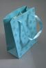 Turquoise Gift Bag with Snowflake Glitter Print. Ribbon Handles. Approx Size 15cm x 12cm x 6cm - view 1