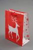 Glossy Red Christmas Gift Bag with White Reindeer Design. Red Corded Handles. Size Approx 15cm x 12cm x 6cm. - view 1