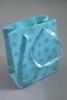 Turquoise Gift Bag with Snowflake Glitter Print. Ribbon Handles. Approx Size 15cm x 12cm x 6cm - view 2