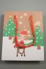 Christmas Scene Elf on a Reindeer Gift Bag with Red Cord Handles. Approx Size 15cm x 12cm x 6cm - view 3