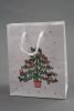 Merry Christmas and Tree Design Gift Bag with White Cord Handles. Approx Size 15cm x 12cm  x 6cm. - view 1